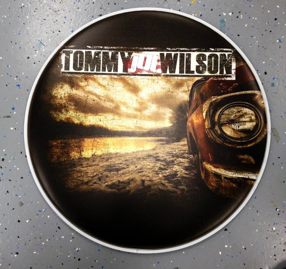 Custom-printed bass drum head with band logo or artwork
