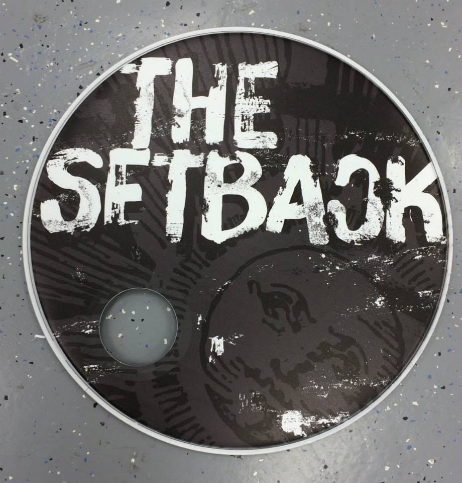 Custom-printed bass drum head with band logo or artwork