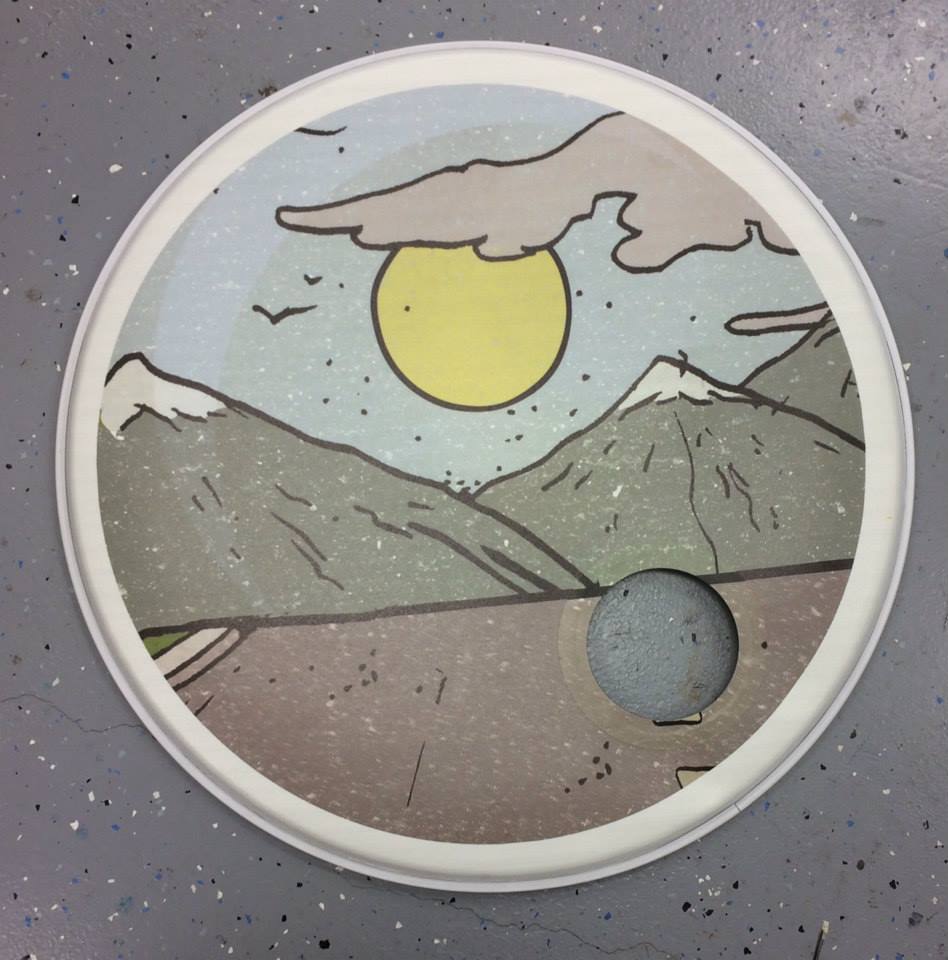 Custom-printed bass drum head with band logo or artwork