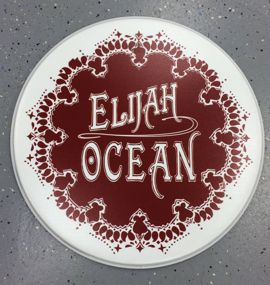 Custom-printed bass drum head with band logo or artwork