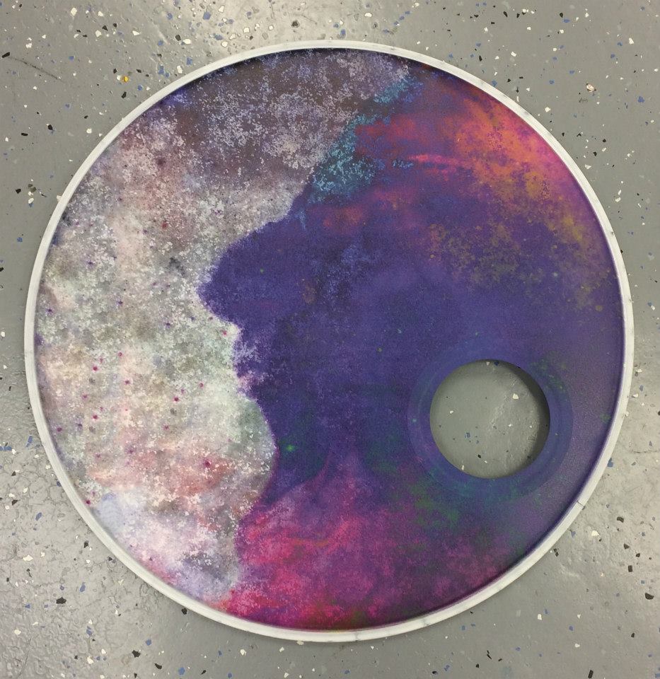 Custom-printed bass drum head with band logo or artwork