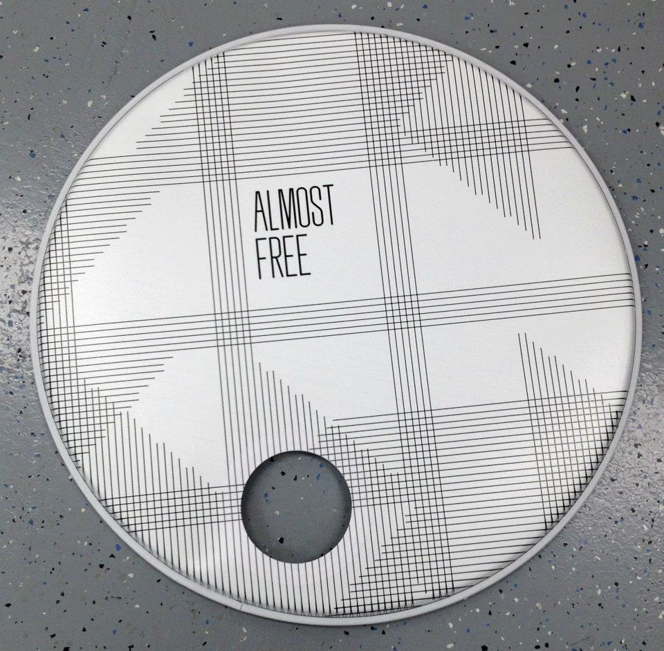 Custom-printed bass drum head with band logo or artwork